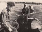 Григорьев В.М. и Кузьмин П.П. переправляются на лодке по реке.  Черный Мыс, Сургут, 1950 г.